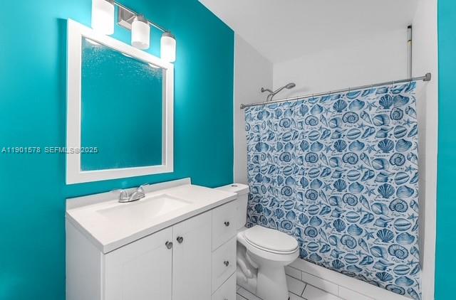 313 Northwest 12th Street Homestead, FL 33030 - Photo 13 of 16 a bathroom with a sink and a mirror