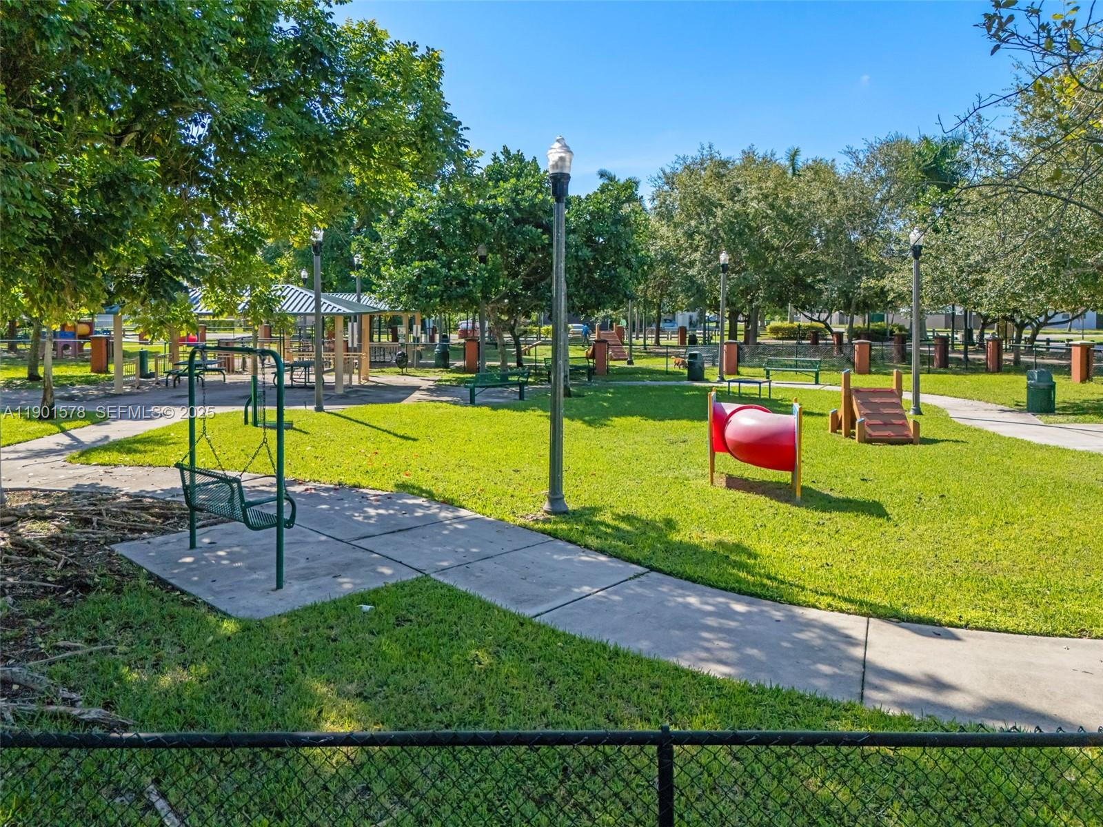 313 Northwest 12th Street Homestead, FL 33030 - Photo 16 of 16 a view of a backyard with swimming pool