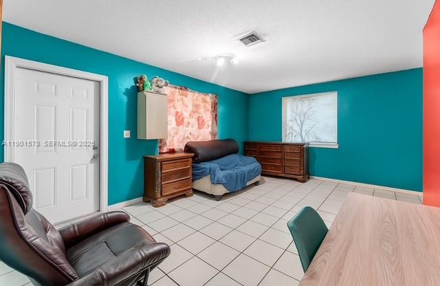 313 Northwest 12th Street Homestead, FL 33030 - Photo 5 of 16 a living room with furniture and a window