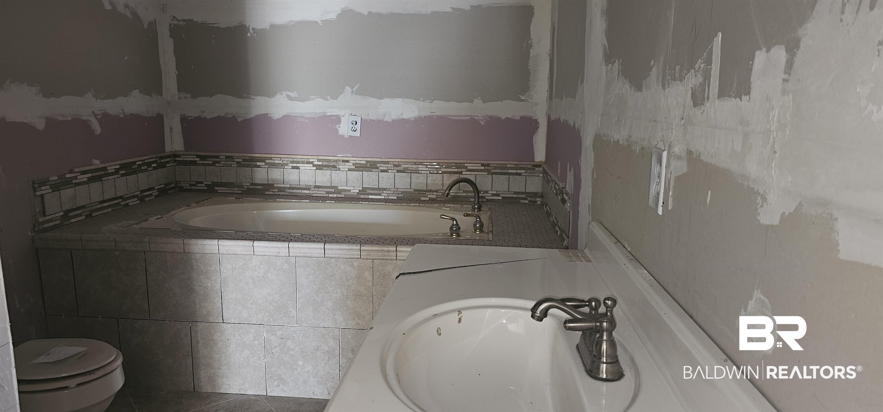 151 Bullard Street Atmore, AL 36502 - Photo 27 of 38 Full bathroom featuring vanity and a bath