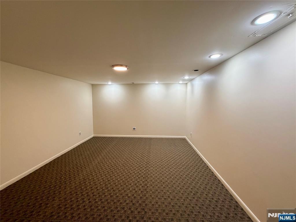 517 Fordham Place Paramus, NJ 07652 - Photo 18 of 25 an empty room with a empty space and window
