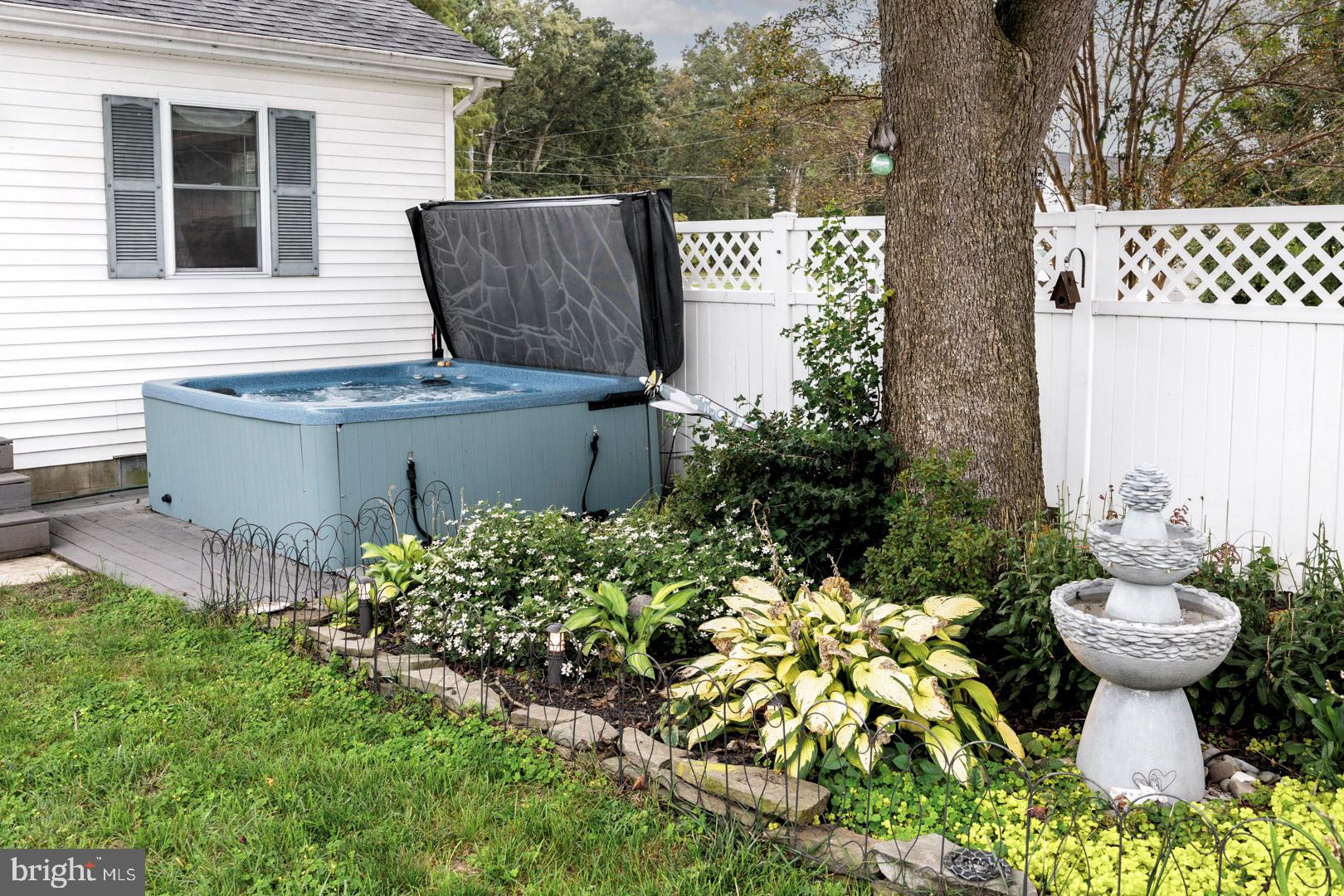 4904 Ravenwood Road Vienna, MD 21869 - Photo 34 of 42 a view of a backyard with plants and garden