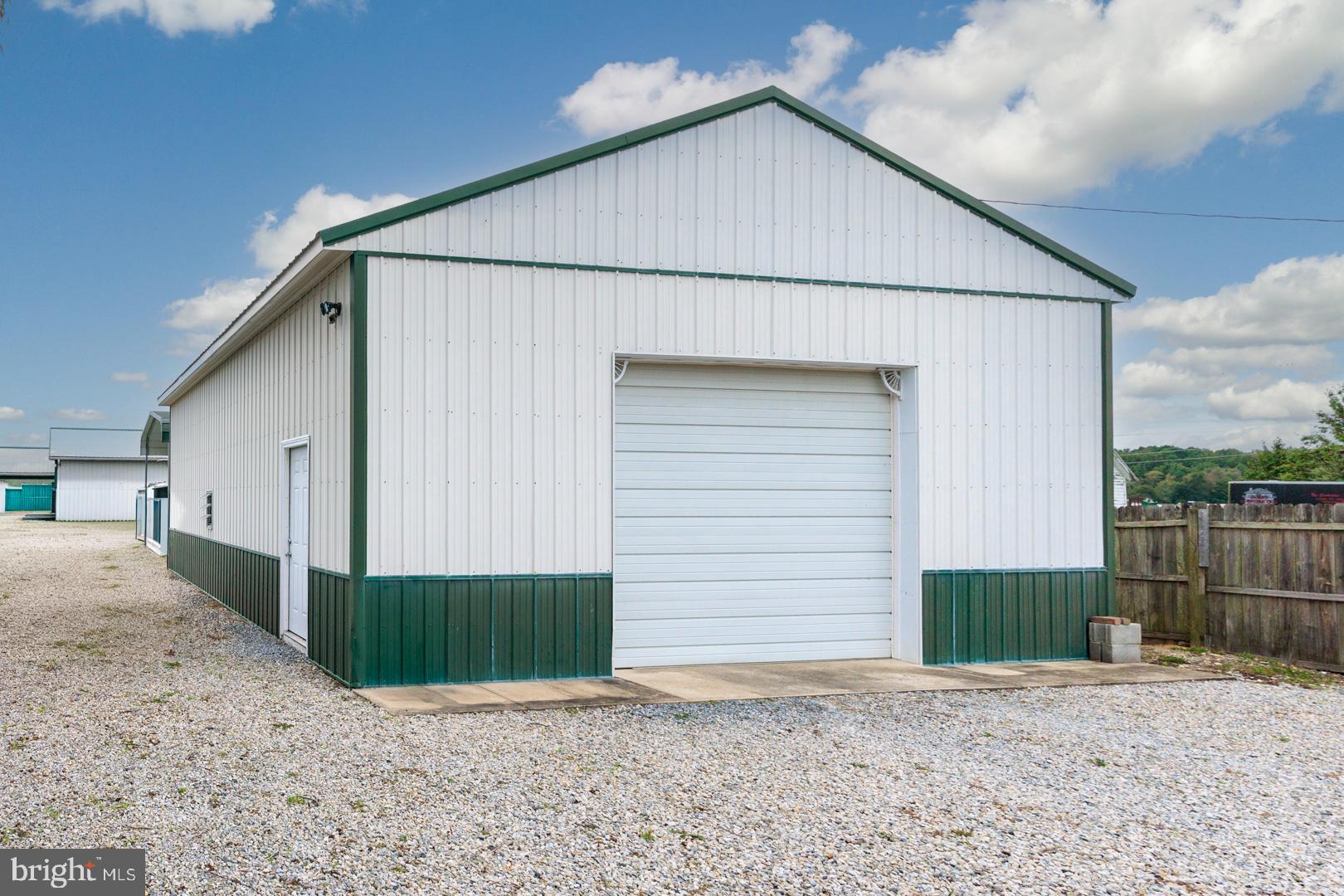 4904 Ravenwood Road Vienna, MD 21869 - Photo 37 of 42 a view of a house with a yard