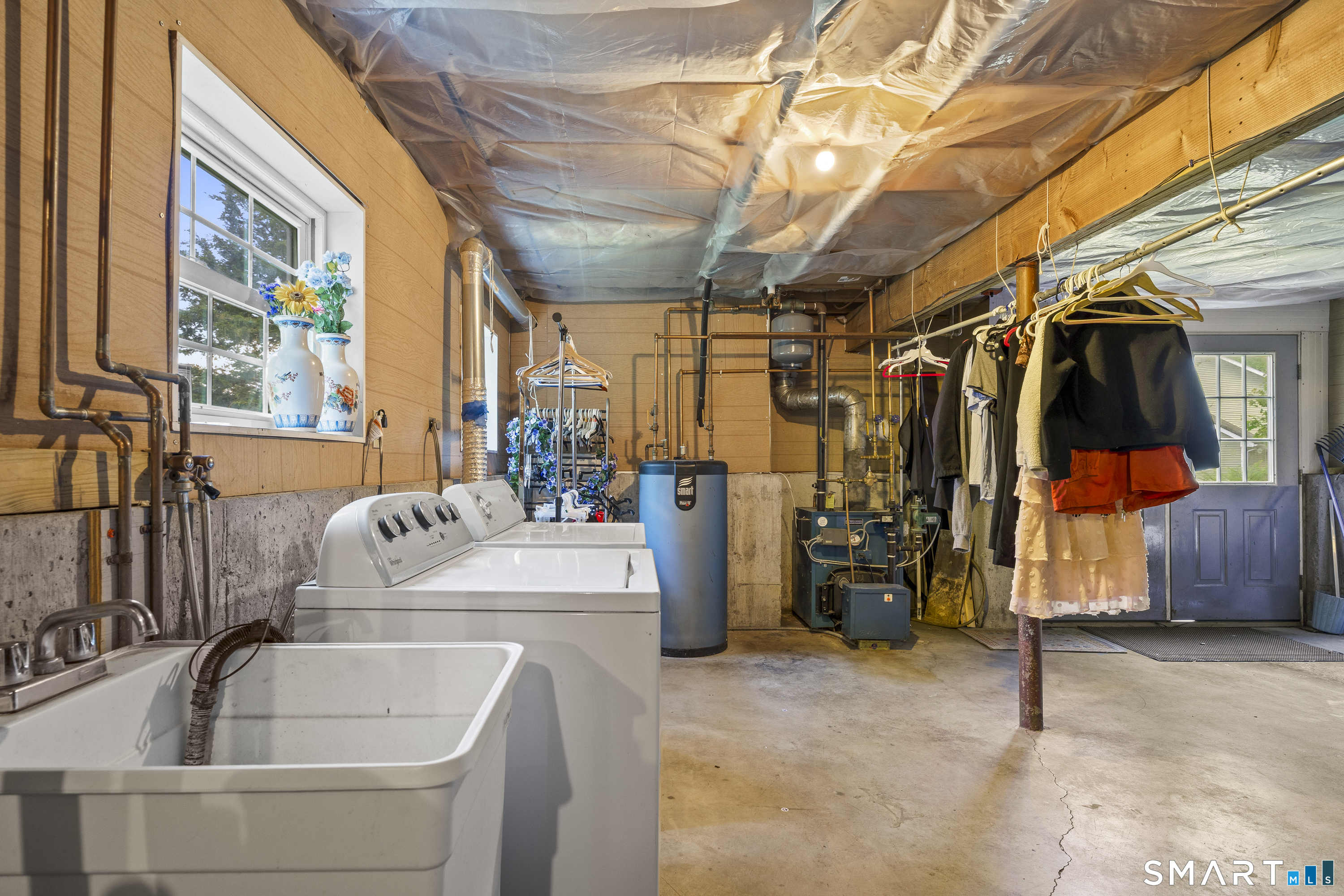 52 Middle Road Preston, CT 06365 - Photo 34 of 39 a view of water heater room with a couch