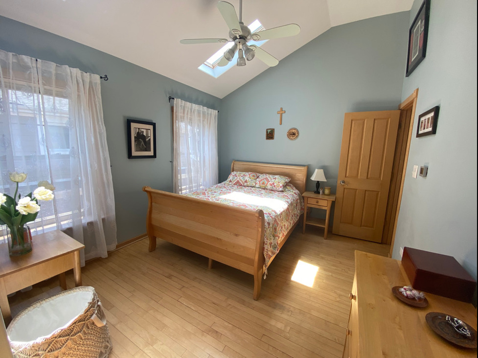 420 North Washington Avenue Park Ridge, IL 60068 - Photo 16 of 36 a bedroom with a bed window and a couch