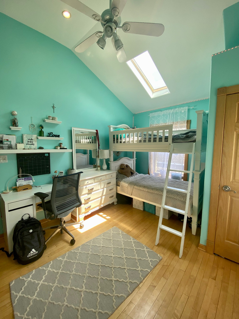 420 North Washington Avenue Park Ridge, IL 60068 - Photo 19 of 36 a bedroom with furniture and a wooden floor