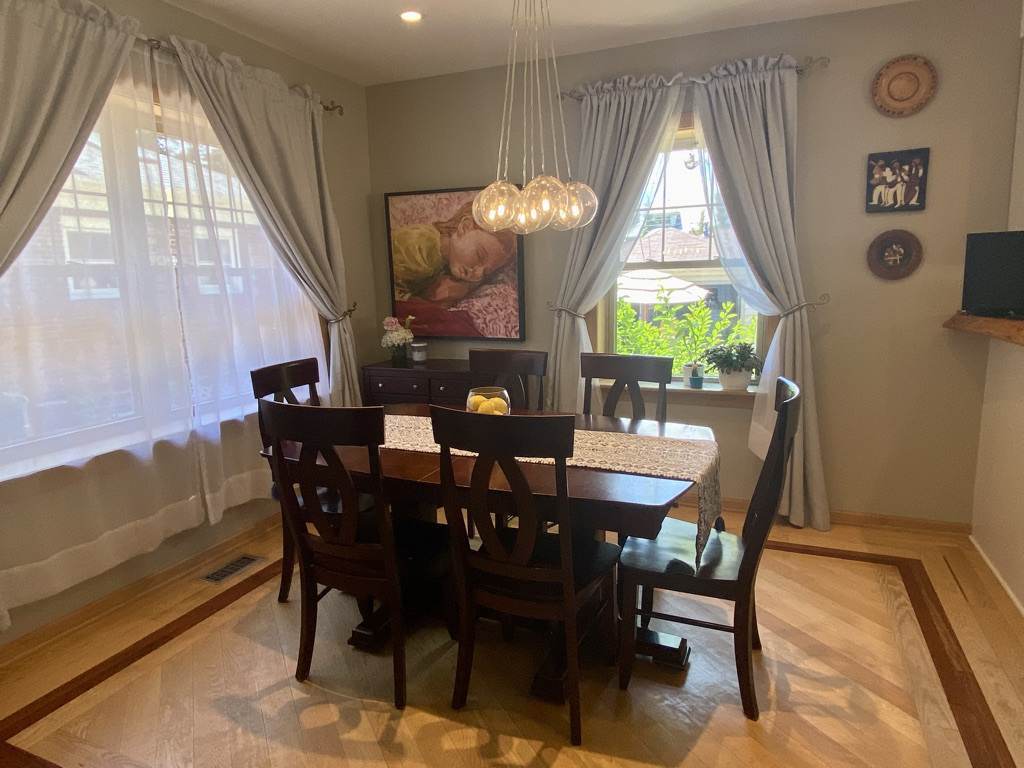 420 North Washington Avenue Park Ridge, IL 60068 - Photo 6 of 36 a view of a dining room with furniture and a chandelier