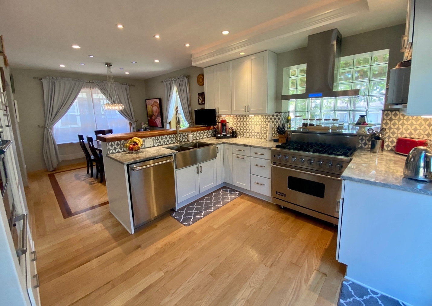 420 North Washington Avenue Park Ridge, IL 60068 - Photo 9 of 36 a kitchen with stainless steel appliances granite countertop a stove and a sink