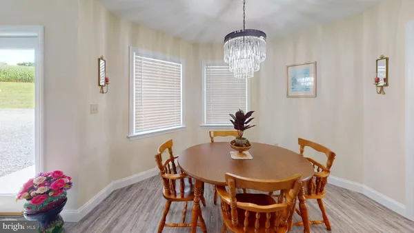 a bathroom with a double vanity sink a mirror a vanity and a shower
