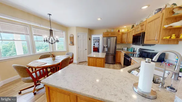 a bedroom with a bed and a night stand