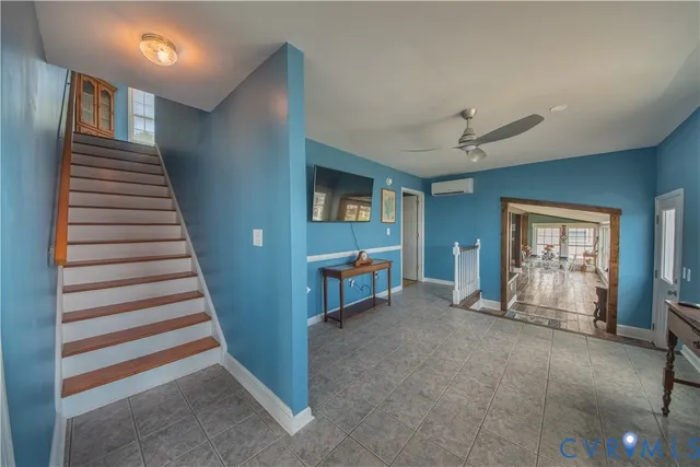 a view of a livingroom with a staircase