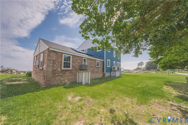 a backyard of a house with lots of green space