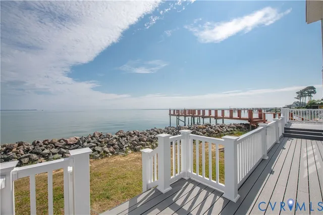 a view of a balcony with wooden floor