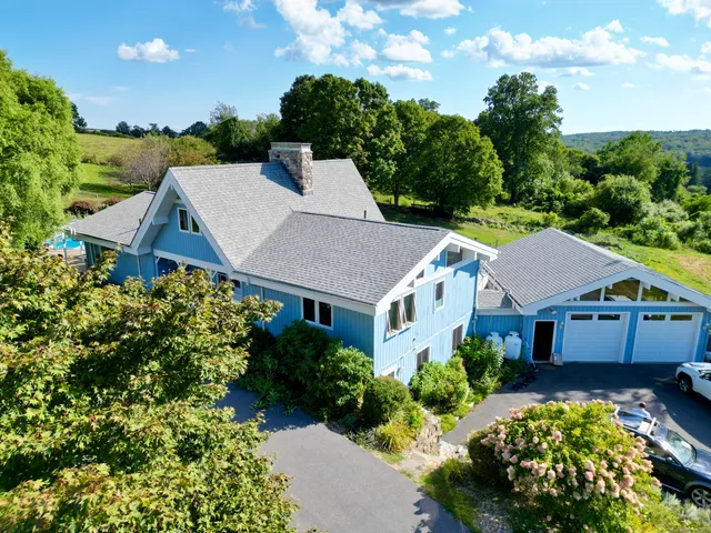 a view of a chairs in front of house