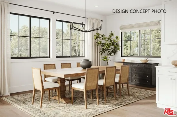a dining room with furniture and window