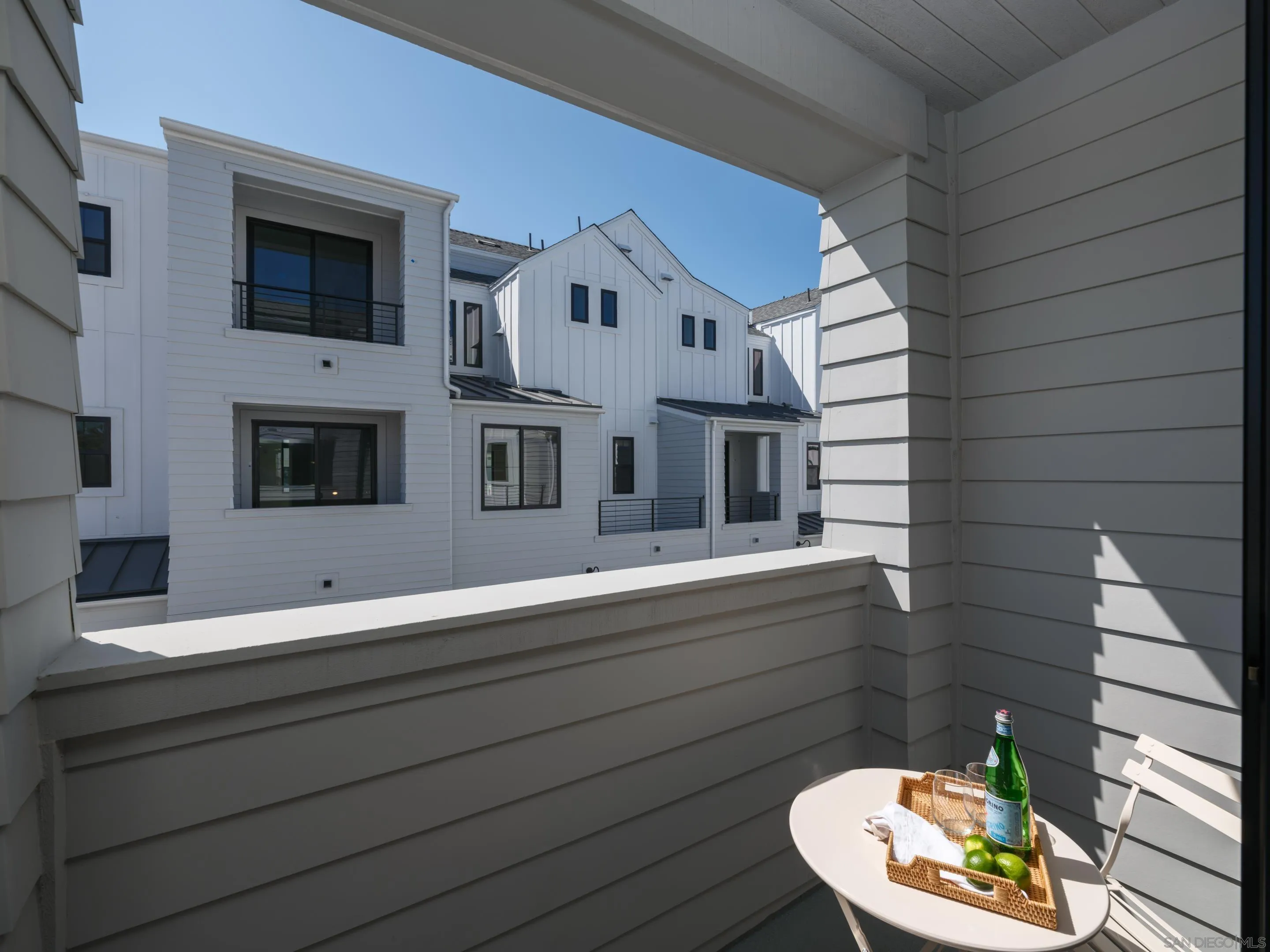1301 Bergamo Place, Unit 101 Encinitas, CA 92024 - Photo 11 of 43 a bathroom with a sink and a mirror
