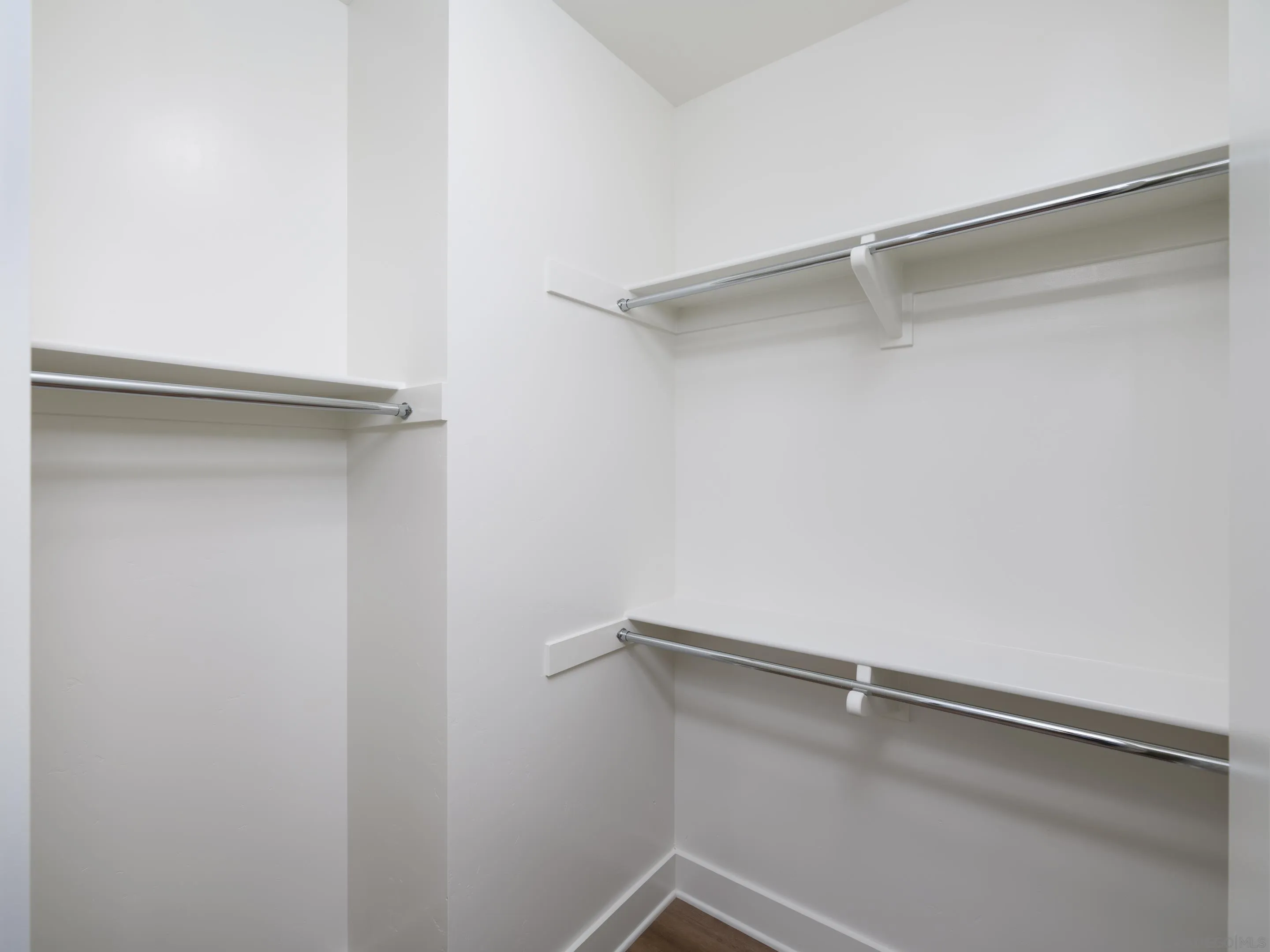 1301 Bergamo Place, Unit 101 Encinitas, CA 92024 - Photo 18 of 43 a close up view of racks on the wall