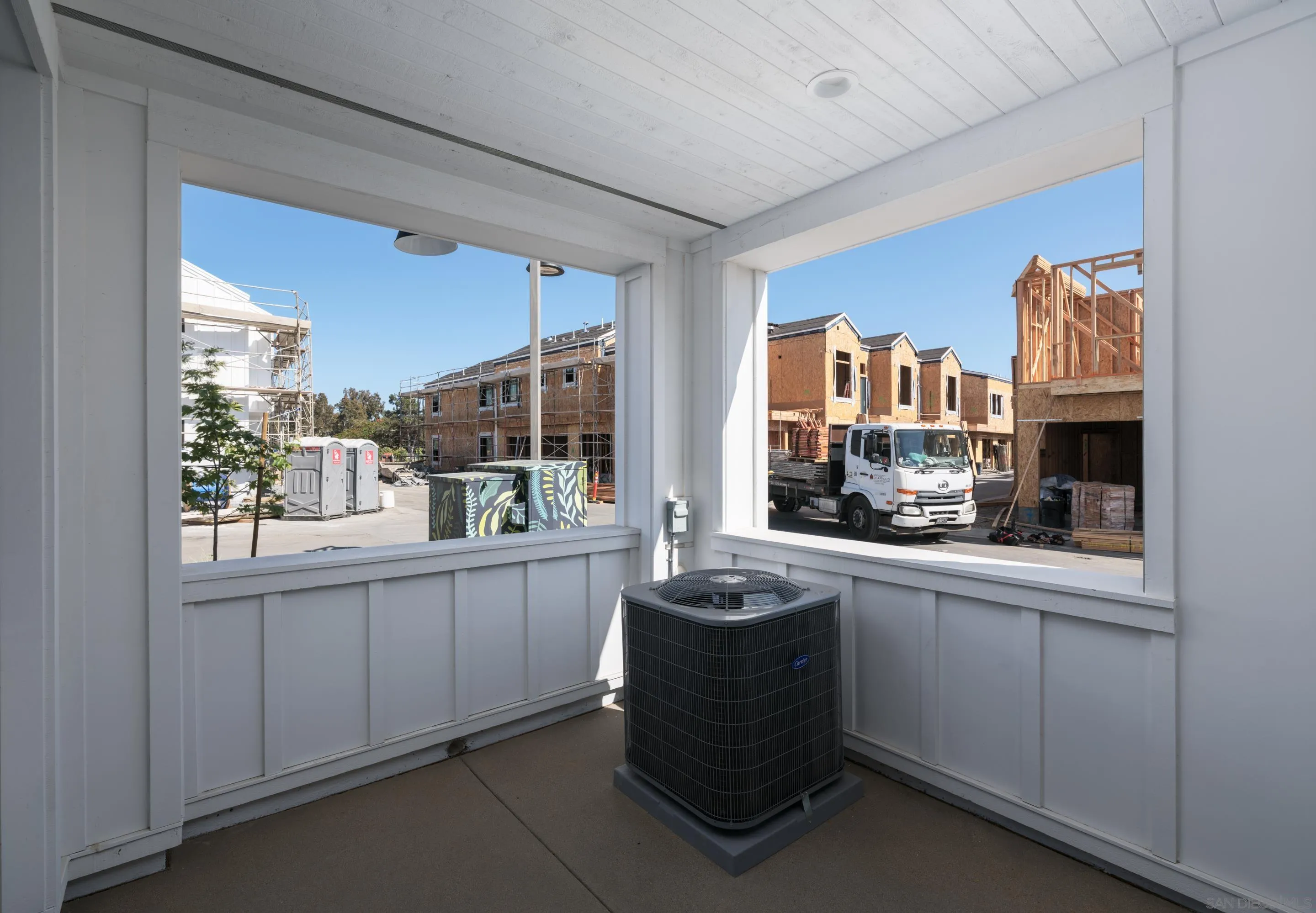 1301 Bergamo Place, Unit 101 Encinitas, CA 92024 - Photo 26 of 43 a kitchen with sink cabinets and window
