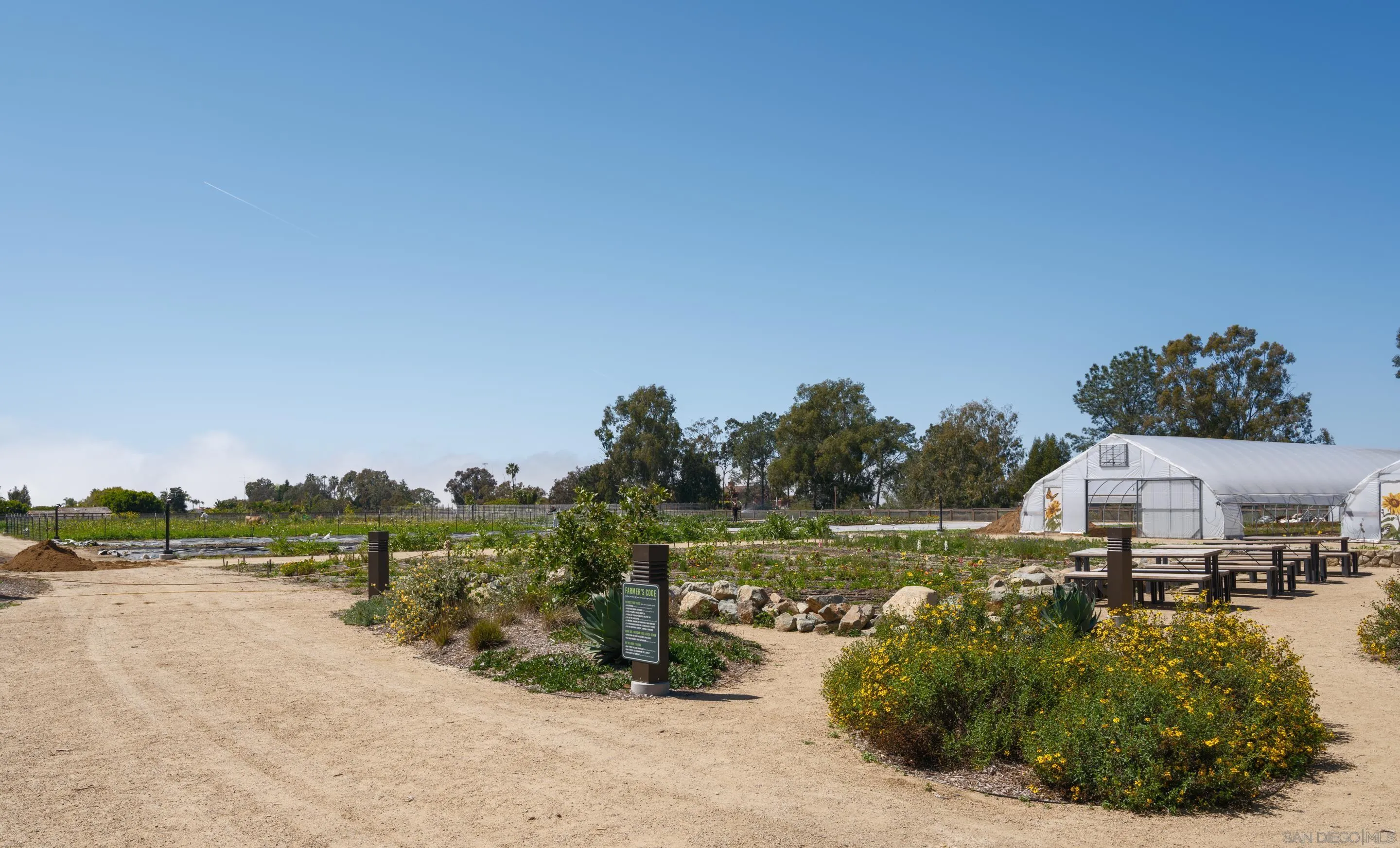1301 Bergamo Place, Unit 101 Encinitas, CA 92024 - Photo 36 of 43 a view of a lake with houses