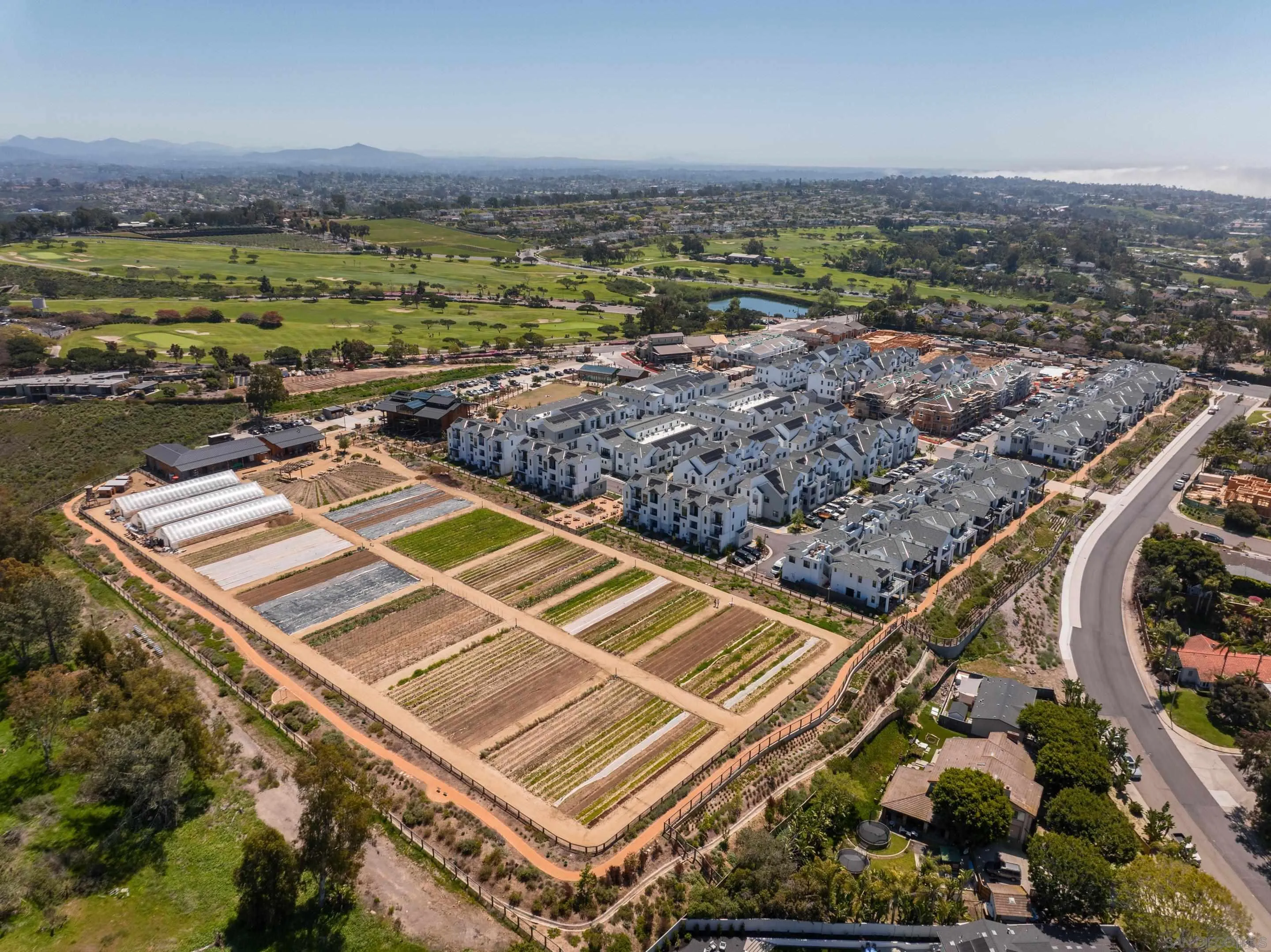 1301 Bergamo Place, Unit 101 Encinitas, CA 92024 - Photo 40 of 43 an aerial view of a pool
