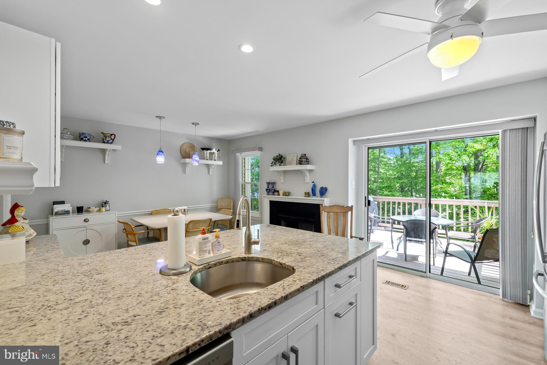 1416 Casino Circle Silver Spring, MD 20906 - Photo 3 of 32 a view of kitchen island a sink and living room