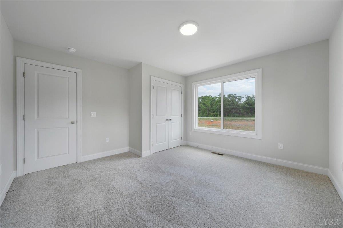 80 Shotman Road Rustburg, VA 24588 - Photo 12 of 23 an empty room with windows