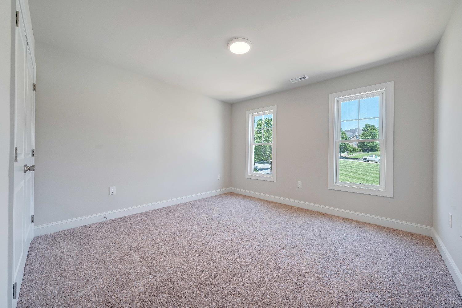80 Shotman Road Rustburg, VA 24588 - Photo 14 of 23 an empty room with windows