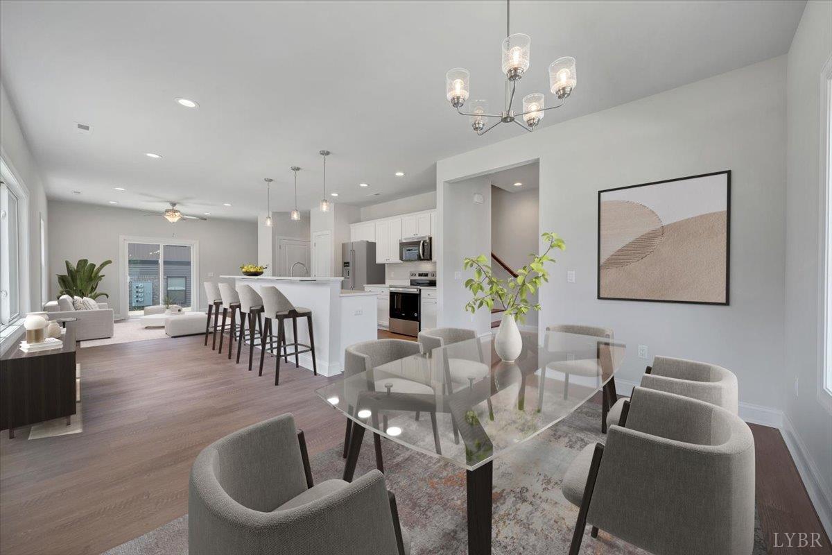 80 Shotman Road Rustburg, VA 24588 - Photo 7 of 23 a view of a dining room with furniture wooden floor and chandelier