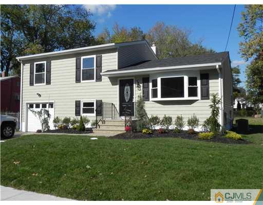 5 Eastlick Road Edison, NJ 08817 - Photo 1 of 16 a front view of house with yard and green space