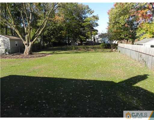 5 Eastlick Road Edison, NJ 08817 - Photo 8 of 16 a view of an outdoor space and swimming pool
