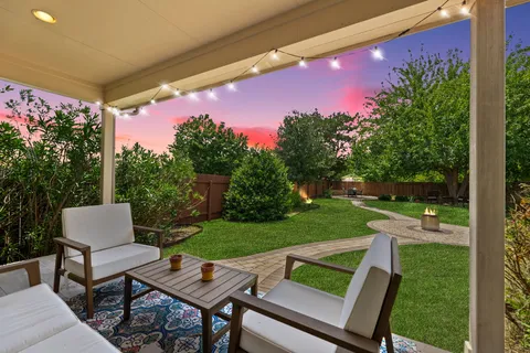 a view of a garden from a balcony
