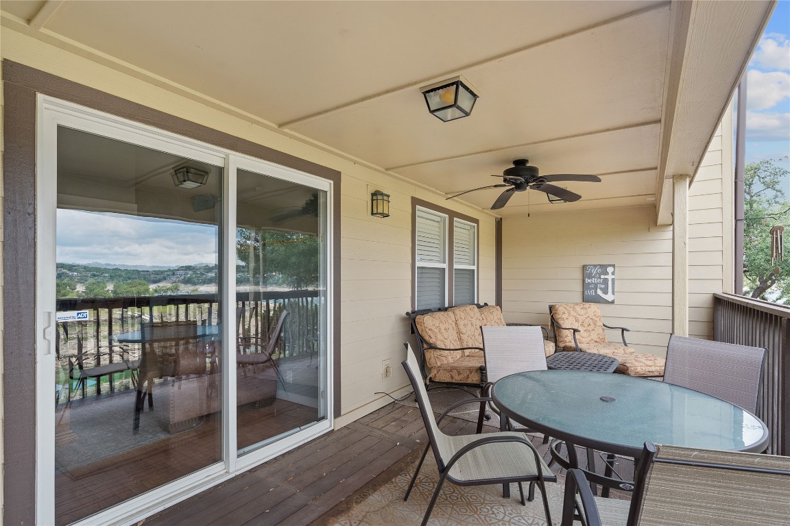 287 Venture Boulevard South Point Venture, TX 78645 - Photo 22 of 40 a view of a dining room with furniture window and outside view