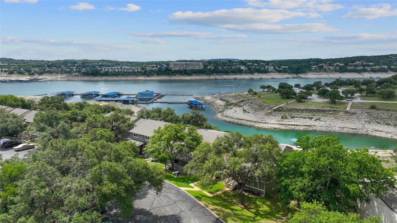 287 Venture Boulevard South Point Venture, TX 78645 - Photo 26 of 40 a view of a lake with a city