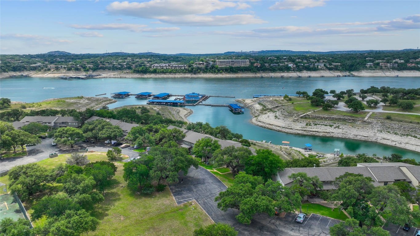287 Venture Boulevard South Point Venture, TX 78645 - Photo 28 of 40 an aerial view of a residential houses with outdoor space and lake view