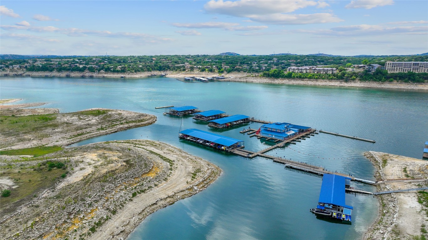 287 Venture Boulevard South Point Venture, TX 78645 - Photo 31 of 40 an aerial view of a house with a lake view