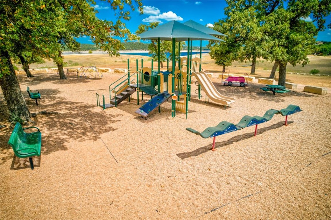287 Venture Boulevard South Point Venture, TX 78645 - Photo 38 of 40 a view of a park with slide