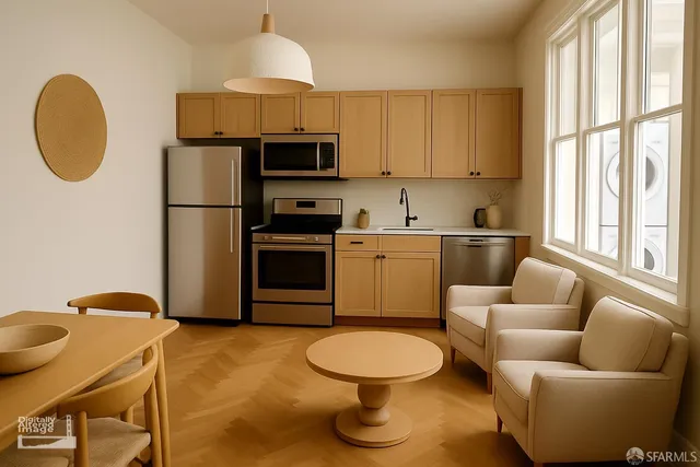 a kitchen with stainless steel appliances a stove a sink a microwave a refrigerator and cabinets