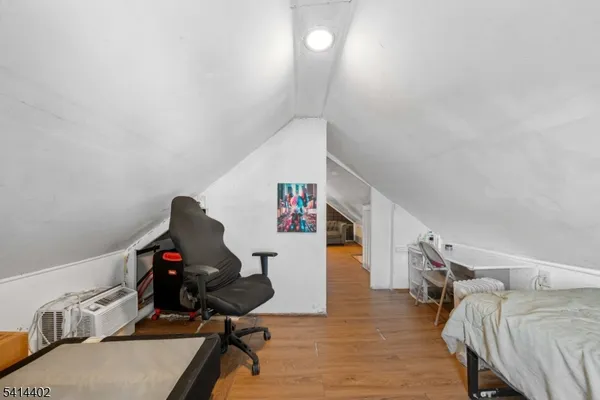 a view of a workspace with furniture and workspace