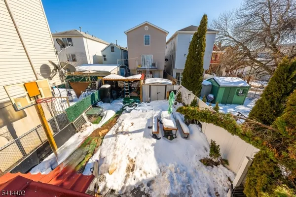 a view of yard with patio