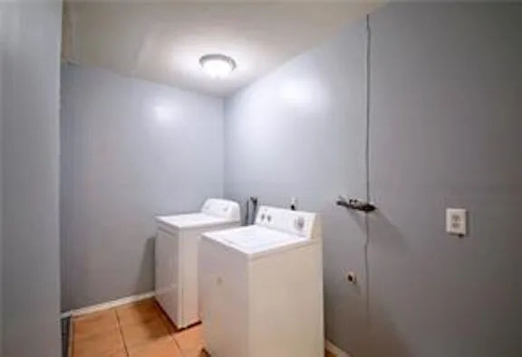 a bathroom with a sink and vanity