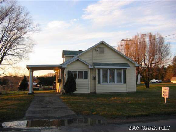 58 Battlefield Road Staunton, VA 24401 - Photo 1 of 1 a front view of a house with a yard