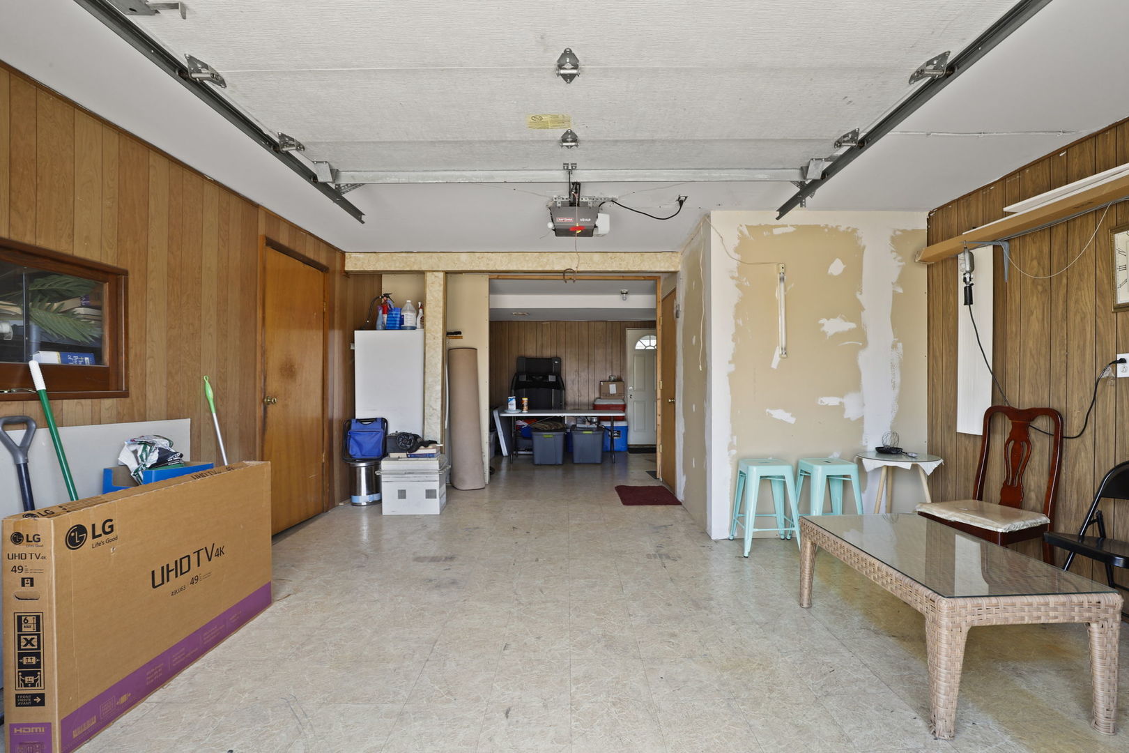 3939 Bobby Lane Schiller Park, IL 60176 - Photo 23 of 26 a view of a livingroom with furniture and a ceiling fan