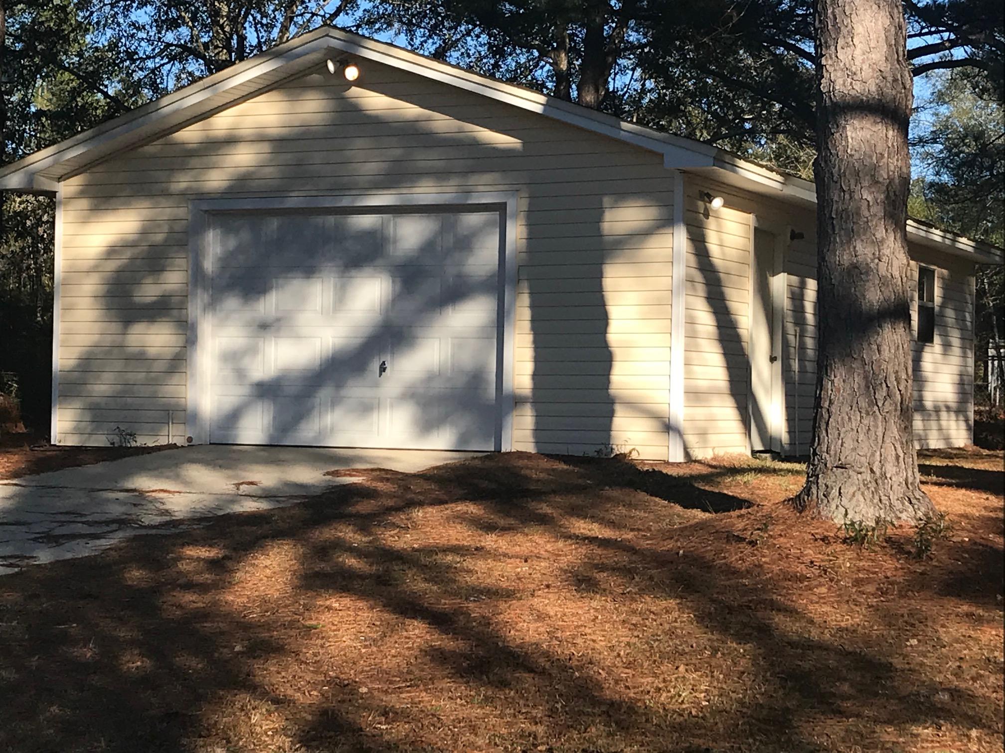 3606 Airport Road Crestview, FL 32539 - Photo 42 of 57 a view of empty room with wooden floor and fan