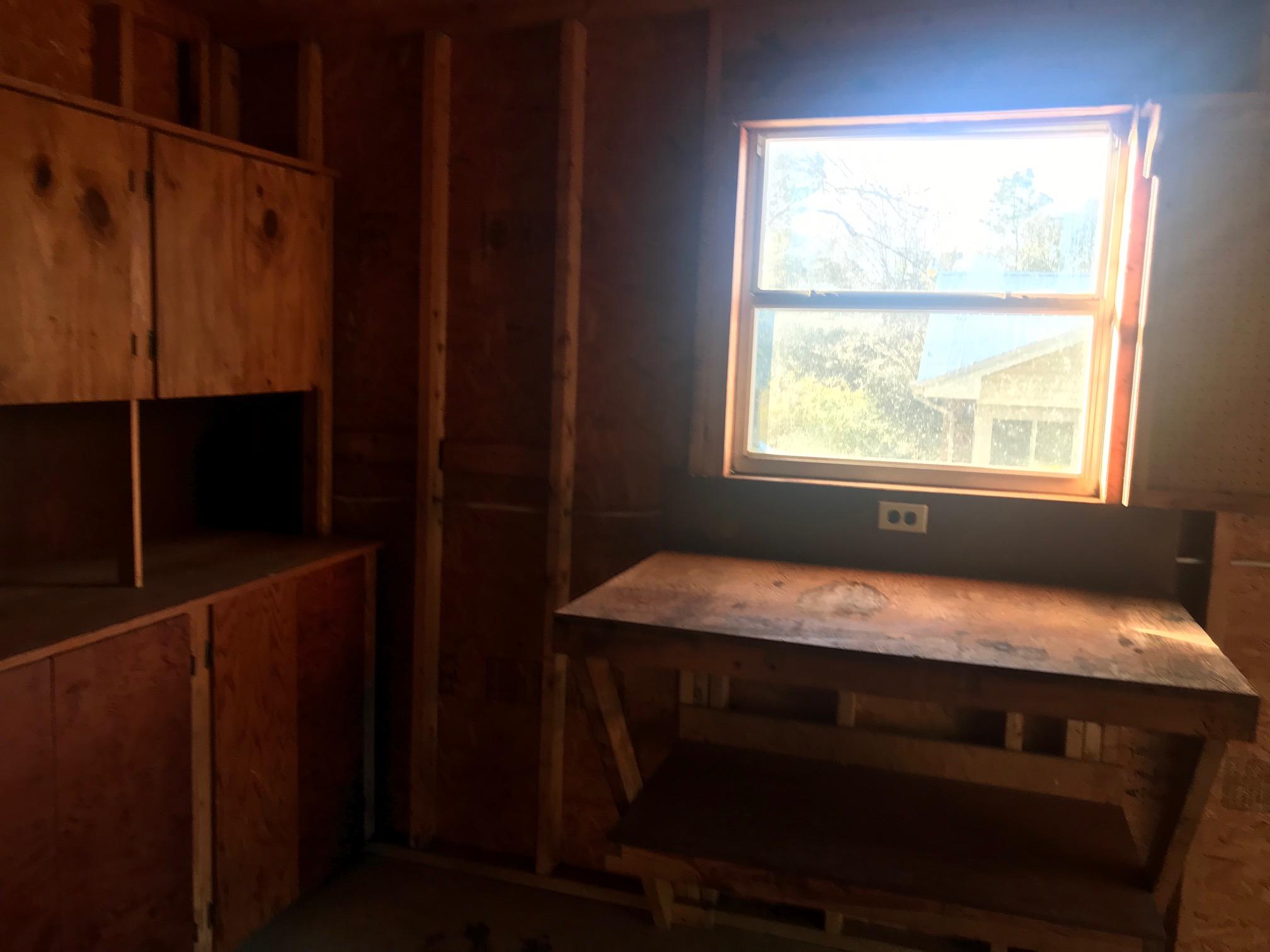 3606 Airport Road Crestview, FL 32539 - Photo 55 of 57 a bedroom with a bed and a window