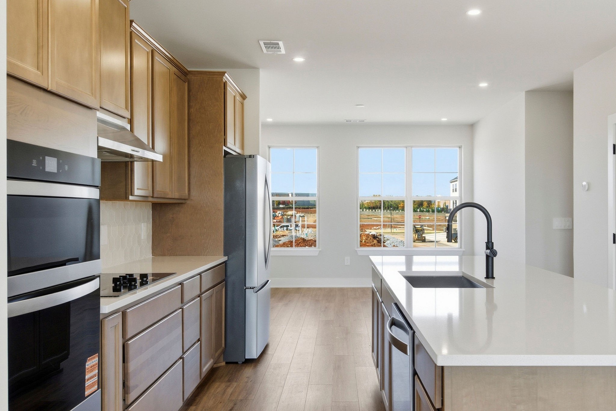 2615 Wilkinson Pike, Unit 1007 Murfreesboro, TN 37129 - Photo 12 of 43 a kitchen with stainless steel appliances granite countertop a sink stove and refrigerator