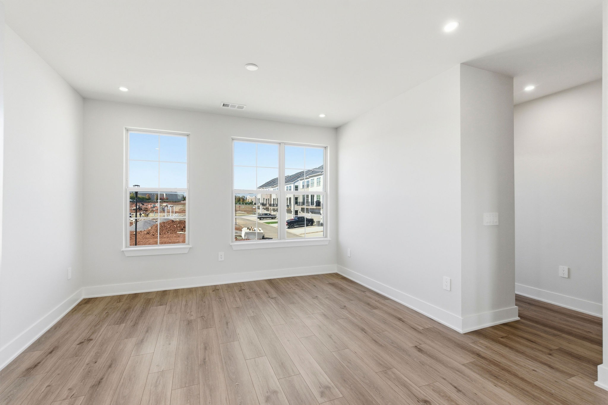 2615 Wilkinson Pike, Unit 1007 Murfreesboro, TN 37129 - Photo 19 of 43 an empty room with wooden floor and window