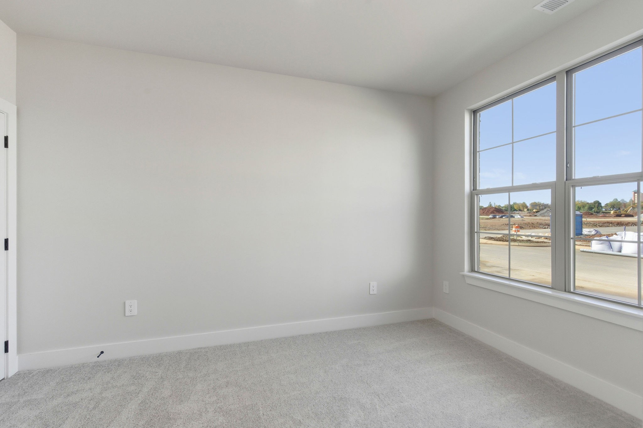 2615 Wilkinson Pike, Unit 1007 Murfreesboro, TN 37129 - Photo 3 of 43 an empty room with a window