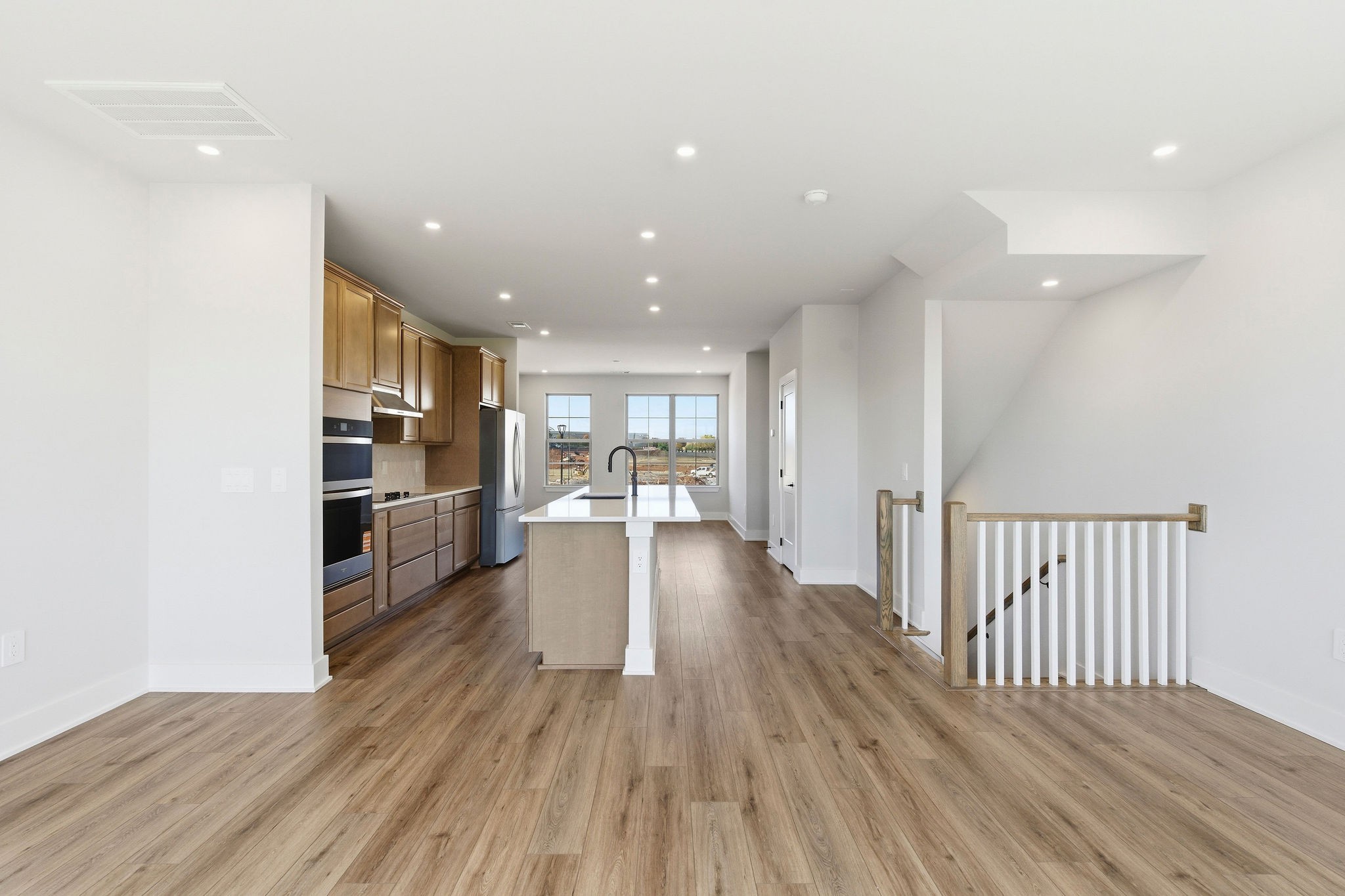 2615 Wilkinson Pike, Unit 1007 Murfreesboro, TN 37129 - Photo 6 of 43 a view of a kitchen with wooden floor