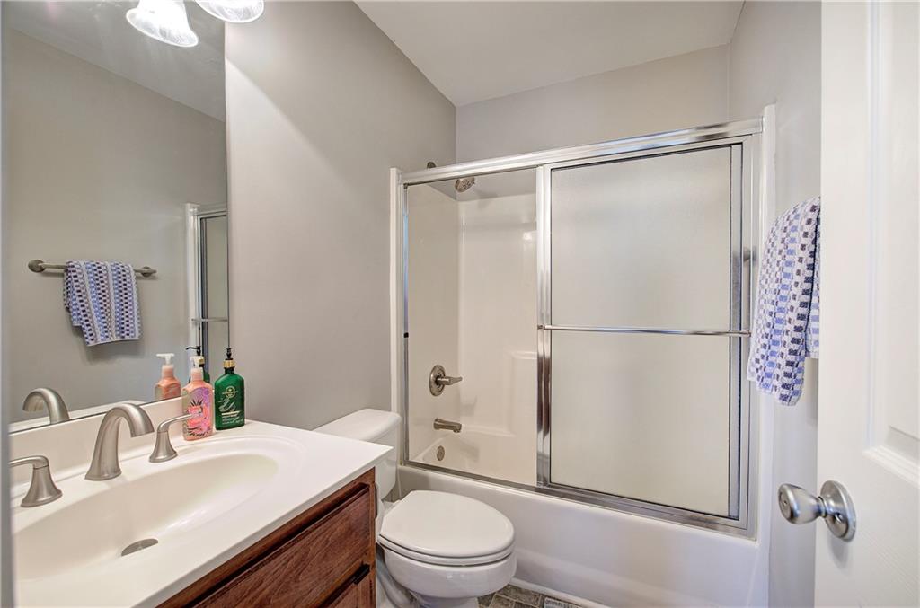 618 Manor Way Cartersville, GA 30120 - Photo 25 of 35 a bathroom with a sink toilet and shower