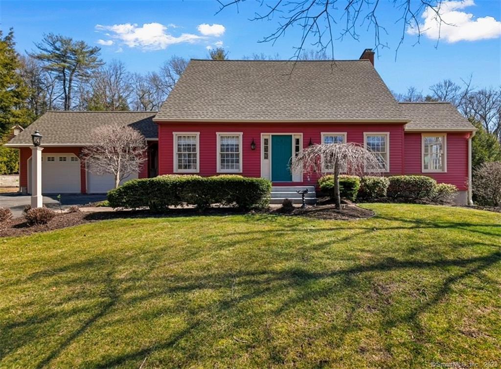 23 Crosswood Road Farmington, CT 06032 - Photo 1 of 1 a front view of a house with a yard